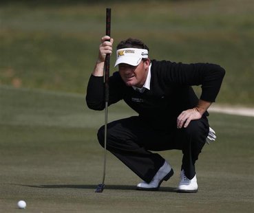 Germany's Alex Cejka lines up a putt on the 17th green during the second day of the European Tour Hong Kong Open golf tournament December 6, Germany's Alex Cejka lines up a putt on the 17th green during the second day of the European Tour Hong Kong Open golf tournament December 6,