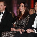 Britain's Prince William (L-R) and his wife Catherine, the Duchess of Cambridge, sit with Natural History Museum Director Michael Dixon befo Britain's Prince William (L-R) and his wife Catherine, the Duchess of Cambridge, sit with Natural History Museum Director Michael Dixon befo