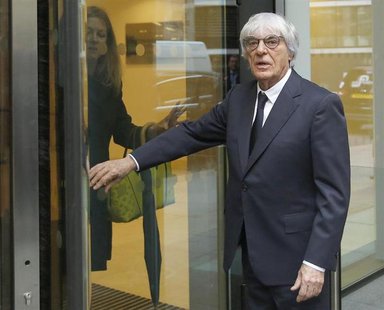 Formula One Chief Executive Bernie Ecclestone arrives at the High Court in central London November 6, 2013. REUTERS/Olivia Harris Formula One Chief Executive Bernie Ecclestone arrives at the High Court in central London November 6, 2013. REUTERS/Olivia Harris