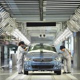 Employees work at the third factory of Dongfeng Peugeot Citroen Automobile company, after its inauguration ceremony, in Wuhan, in this July Employees work at the third factory of Dongfeng Peugeot Citroen Automobile company, after its inauguration ceremony, in Wuhan, in this July