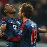 Bayern Munich's Mario Goetze (R) celebrates with David Alaba after scoring a goal against Manchester City during their Champions League Grou Bayern Munich's Mario Goetze (R) celebrates with David Alaba after scoring a goal against Manchester City during their Champions League Grou