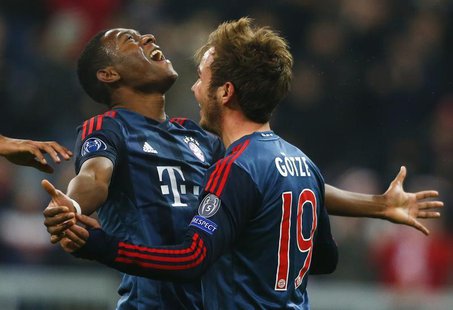 Bayern Munich's Mario Goetze (R) celebrates with David Alaba after scoring a goal against Manchester City during their Champions League Grou Bayern Munich's Mario Goetze (R) celebrates with David Alaba after scoring a goal against Manchester City during their Champions League Grou