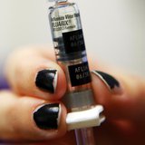 A nurse prepares to administer an influenza vaccine at Boston Children's Hospital in Boston, Massachusetts January 10, 2013. REUTERS/Brian S A nurse prepares to administer an influenza vaccine at Boston Children's Hospital in Boston, Massachusetts January 10, 2013. REUTERS/Brian S