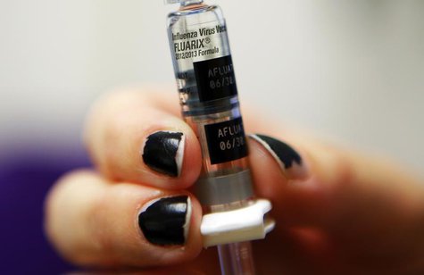 A nurse prepares to administer an influenza vaccine at Boston Children's Hospital in Boston, Massachusetts January 10, 2013. REUTERS/Brian S A nurse prepares to administer an influenza vaccine at Boston Children's Hospital in Boston, Massachusetts January 10, 2013. REUTERS/Brian S