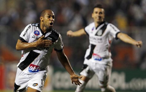 Felipe Bastos (L) of Brazil's Ponte Preta celebrates after he scored a goal during their Copa Sudamericana first leg final soccer match agai Felipe Bastos (L) of Brazil's Ponte Preta celebrates after he scored a goal during their Copa Sudamericana first leg final soccer match agai