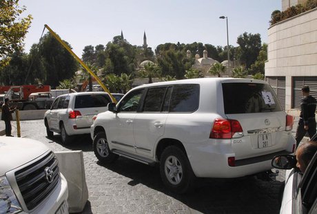 United Nations (U.N.) vehicles transporting a team of experts from the Organisation for the Prohibition of Chemical Weapons (OPCW), leave th United Nations (U.N.) vehicles transporting a team of experts from the Organisation for the Prohibition of Chemical Weapons (OPCW), leave th