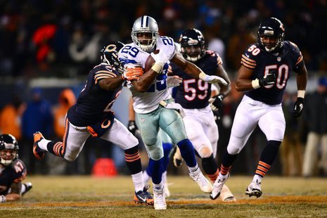 Dec 9, 2013; Chicago, IL, USA; Dallas Cowboys running back DeMarco Murray (29) runs the ball during the fourth quarter against the Chicago B Dec 9, 2013; Chicago, IL, USA; Dallas Cowboys running back DeMarco Murray (29) runs the ball during the fourth quarter against the Chicago B