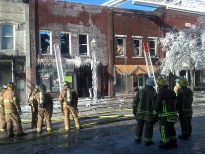 With hot spots continuing to flare up, firefighters stand by to help the damage in downtown Ripon. (Photo from: FOX 11) With hot spots continuing to flare up, firefighters stand by to help the damage in downtown Ripon. (Photo from: FOX 11)