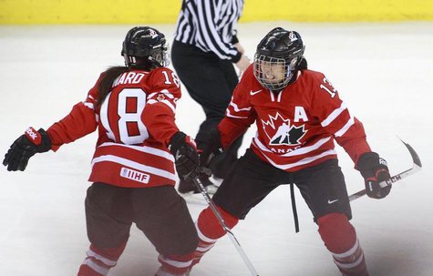Canada's Caroline Ouellette (R) celebrates her goal with team mate Catherine Ward during the second period of their gold medal game against Canada's Caroline Ouellette (R) celebrates her goal with team mate Catherine Ward during the second period of their gold medal game against