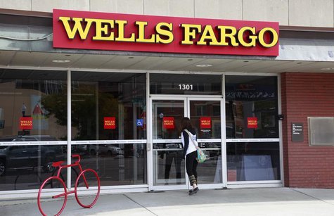A customer enters the Wells Fargo bank branch in Golden, Colorado October 11, 2013. REUTERS/Rick Wilking A customer enters the Wells Fargo bank branch in Golden, Colorado October 11, 2013. REUTERS/Rick Wilking
