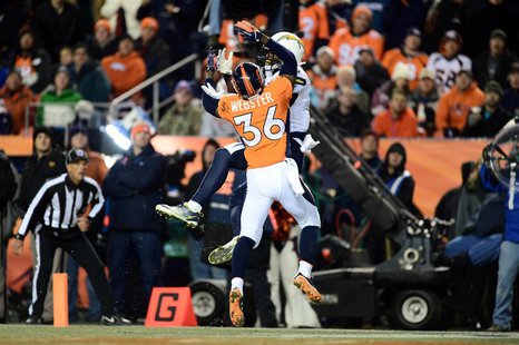 Dec 12, 2013; Denver, CO, USA; San Diego Chargers wide receiver Keenan Allen (13) scores his second touchdown in front of Denver Broncos cor Dec 12, 2013; Denver, CO, USA; San Diego Chargers wide receiver Keenan Allen (13) scores his second touchdown in front of Denver Broncos cor