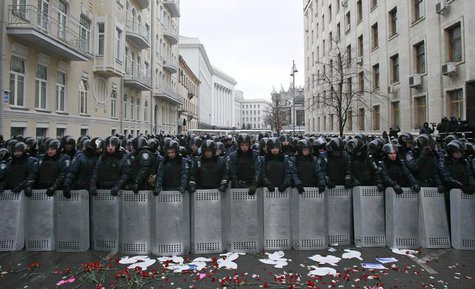 Riot police and Interior Ministry personnel block a street during a rally organized by supporters of EU integration in central Kiev, Decembe Riot police and Interior Ministry personnel block a street during a rally organized by supporters of EU integration in central Kiev, Decembe