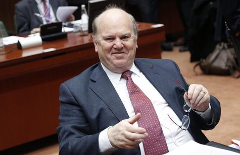Ireland's Finance Minister Michael Noonan smiles at the start of a European Union finance ministers meeting in Brussels December 10, 2013. R Ireland's Finance Minister Michael Noonan smiles at the start of a European Union finance ministers meeting in Brussels December 10, 2013. R