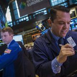 Trader Michael Zicchinolfi works on the floor of the New York Stock Exchange December 11, 2013. REUTERS/Brendan McDermid Trader Michael Zicchinolfi works on the floor of the New York Stock Exchange December 11, 2013. REUTERS/Brendan McDermid