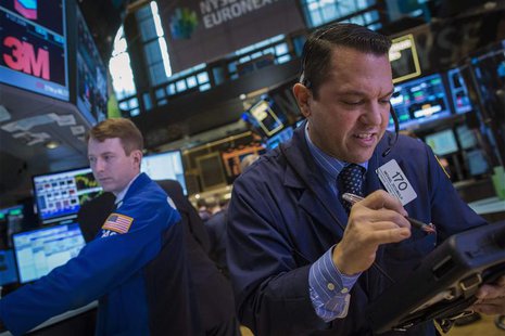 Trader Michael Zicchinolfi works on the floor of the New York Stock Exchange December 11, 2013. REUTERS/Brendan McDermid Trader Michael Zicchinolfi works on the floor of the New York Stock Exchange December 11, 2013. REUTERS/Brendan McDermid