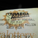 A mega million lottery ticket is shown in this illustration photograph in San Diego, California December 11, 2013. REUTERS/Mike Blake A mega million lottery ticket is shown in this illustration photograph in San Diego, California December 11, 2013. REUTERS/Mike Blake