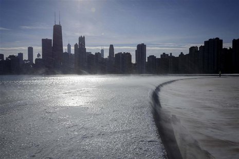 Ice covers the shore of Lake Michigan in Chicago where temperatures have dropped well below freezing, December 12, 2013. REUTERS/John Gress Ice covers the shore of Lake Michigan in Chicago where temperatures have dropped well below freezing, December 12, 2013. REUTERS/John Gress