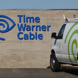 A cable truck returns to a Time Warner Cable office in San Diego, California December 11, 2013. REUTERS/Mike Blake A cable truck returns to a Time Warner Cable office in San Diego, California December 11, 2013. REUTERS/Mike Blake