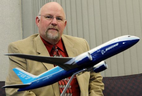 Aerospace Machinist Industrial District Lodge 751 president Tom Wroblewski sits behind a model of the Boeing 787 Dreamliner jet at his union Aerospace Machinist Industrial District Lodge 751 president Tom Wroblewski sits behind a model of the Boeing 787 Dreamliner jet at his union