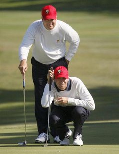 U.S. team members Kenny Perry (L) and Sean O'Hair talk on the 13th hole during their fourball match at the Presidents Cup golf tournament at U.S. team members Kenny Perry (L) and Sean O'Hair talk on the 13th hole during their fourball match at the Presidents Cup golf tournament at