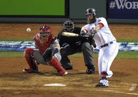 Oct 30, 2013; Boston, MA, USA; Boston Red Sox first baseman Mike Napoli hits a RBI single against the St. Louis Cardinals in the fourth inni Oct 30, 2013; Boston, MA, USA; Boston Red Sox first baseman Mike Napoli hits a RBI single against the St. Louis Cardinals in the fourth inni