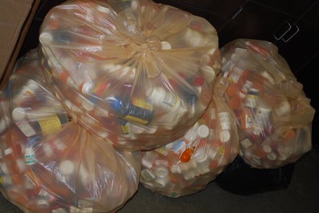 Empty plastic medicine containers wait to be recycled after drugs were properly disposed Empty plastic medicine containers wait to be recycled after drugs were properly disposed