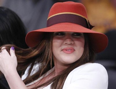 Khloe Kardashian sits courtside before the Los Angeles Lakers play the Dallas Mavericks in Game 1 of their NBA Western Conference semi-final Khloe Kardashian sits courtside before the Los Angeles Lakers play the Dallas Mavericks in Game 1 of their NBA Western Conference semi-final