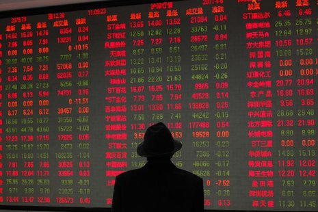 A man looks at an electronic board at a brokerage house in Shanghai April 6, 2011. REUTERS/Aly Song A man looks at an electronic board at a brokerage house in Shanghai April 6, 2011. REUTERS/Aly Song