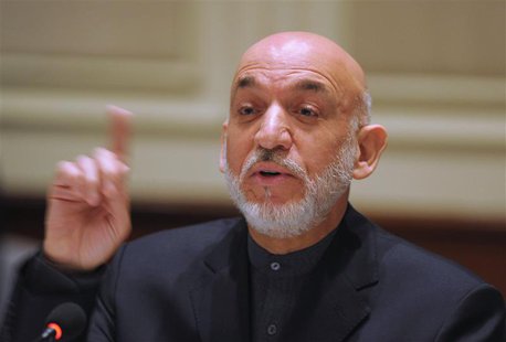 Afghanistan's President Hamid Karzai gestures as he addresses media representatives during a press interaction in New Delhi December 14, 201 Afghanistan's President Hamid Karzai gestures as he addresses media representatives during a press interaction in New Delhi December 14, 201