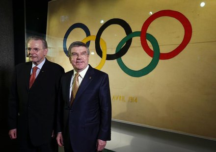 International Olympic Committee (IOC) President Thomas Bach (R) poses with his predecessor Jacques Rogge in a new presentation room at the O International Olympic Committee (IOC) President Thomas Bach (R) poses with his predecessor Jacques Rogge in a new presentation room at the O