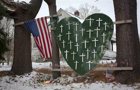 A heart is emblazoned with crosses to commemorate the 26 Sandy Hook Elementary School shooting victims in Sandy Hook village in Newtown, Connecticut December 13, 2013. Credit: Reuters/Carlo Allegri A heart is emblazoned with crosses to commemorate the 26 Sandy Hook Elementary School shooting victims in Sandy Hook village in Newtown, Connecticut December 13, 2013. Credit: Reuters/Carlo Allegri