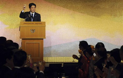 Japan's Prime Minister Shinzo Abe (top L) raises the glass for the toast with ASEAN countries' leaders during a gala dinner of the ASEAN-Jap Japan's Prime Minister Shinzo Abe (top L) raises the glass for the toast with ASEAN countries' leaders during a gala dinner of the ASEAN-Jap