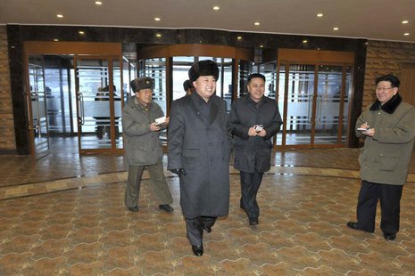 North Korean leader Kim Jong Un (C) visits the Masik-Ryong Ski Resort, which is near completion, near Wonsan in this undated photo released North Korean leader Kim Jong Un (C) visits the Masik-Ryong Ski Resort, which is near completion, near Wonsan in this undated photo released