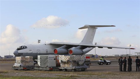 Workers load humanitarian aid from United Nations onto a plane for Syrian families, in Arbil airport, about 350 km (220 miles) north of Bagh Workers load humanitarian aid from United Nations onto a plane for Syrian families, in Arbil airport, about 350 km (220 miles) north of Bagh