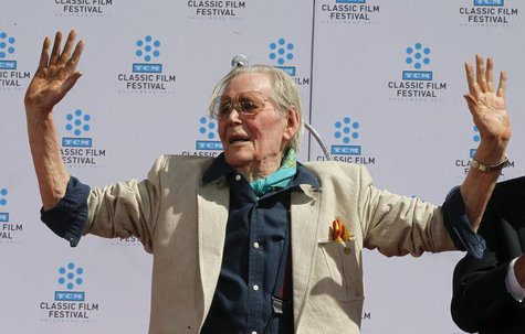 Irish-born actor Peter O'Toole displays his cement-covered hands after placing his handprints in cement during hand and footprint ceremonies Irish-born actor Peter O'Toole displays his cement-covered hands after placing his handprints in cement during hand and footprint ceremonies
