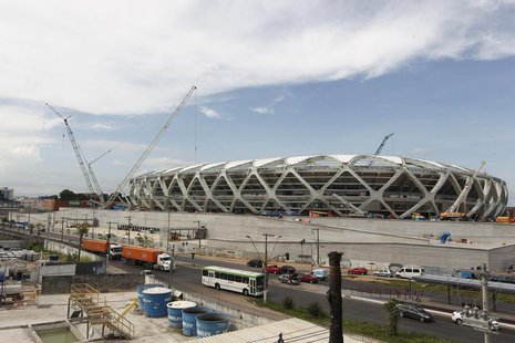 The Arena Amazonia stadium is under construction to host several 2014 World Cup soccer games, in Manaus December 14, 2013. REUTERS/Bruno Kel The Arena Amazonia stadium is under construction to host several 2014 World Cup soccer games, in Manaus December 14, 2013. REUTERS/Bruno Kel