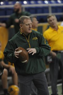 Chris Klieman warming up with NDSU players recently. Chris Klieman warming up with NDSU players recently.