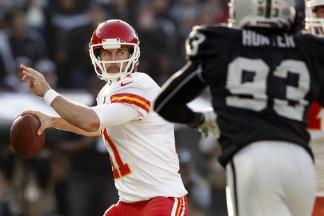 Dec 15, 2013; Oakland, CA, USA; Kansas City Chiefs quarterback Alex Smith (11) prepares to throw a pass against the Oakland Raiders in the s Dec 15, 2013; Oakland, CA, USA; Kansas City Chiefs quarterback Alex Smith (11) prepares to throw a pass against the Oakland Raiders in the s