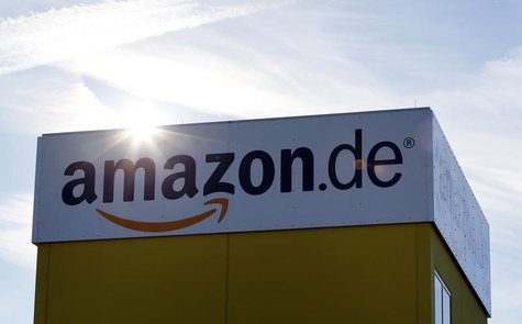 The sun reflects off Amazon's logistics centre in Graben near Augsburg December 16, 2013. REUTERS/Michaela Rehle The sun reflects off Amazon's logistics centre in Graben near Augsburg December 16, 2013. REUTERS/Michaela Rehle