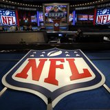The NFL logo and set are seen at New York's Radio City Music Hall before the start of the 2013 NFL Draft April 25, 2013. REUTERS/Shannon Sta The NFL logo and set are seen at New York's Radio City Music Hall before the start of the 2013 NFL Draft April 25, 2013. REUTERS/Shannon Sta