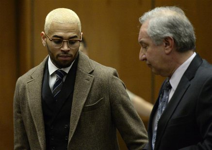 Singer Chris Brown (L) and his attorney Mark Geragos appear in court during a probation violation hearing in which his probation was revoked Singer Chris Brown (L) and his attorney Mark Geragos appear in court during a probation violation hearing in which his probation was revoked