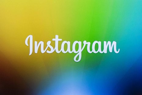 A screen displays the Instagram logo during a presentation by co-founder Kevin Systrom as he announces the launch of a new direct image mess A screen displays the Instagram logo during a presentation by co-founder Kevin Systrom as he announces the launch of a new direct image mess
