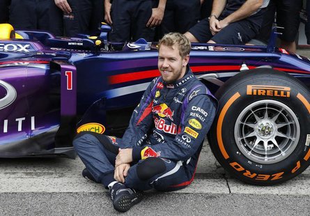 Red Bull Formula One driver Sebastian Vettel of Germany is pictured as he poses for the media with the Red Bull team before the Brazilian F1 Red Bull Formula One driver Sebastian Vettel of Germany is pictured as he poses for the media with the Red Bull team before the Brazilian F1