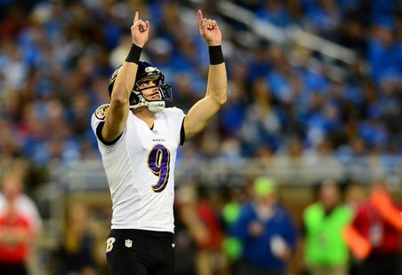 Dec 16, 2013; Detroit, MI, USA; Baltimore Ravens kicker Justin Tucker (9) celebrates after kicking a field goal during the third quarter aga Dec 16, 2013; Detroit, MI, USA; Baltimore Ravens kicker Justin Tucker (9) celebrates after kicking a field goal during the third quarter aga
