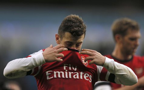 Arsenal's Jack Wilshere reacts after losing their English Premier League soccer match against Manchester City at the Etihad stadium in Manch Arsenal's Jack Wilshere reacts after losing their English Premier League soccer match against Manchester City at the Etihad stadium in Manch