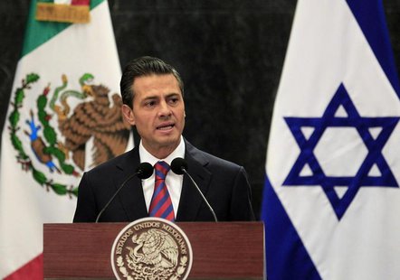 Mexico's President Enrique Pena Nieto gives a speech next to Israel's President Shimon Peres (not pictured) during a news conference after a Mexico's President Enrique Pena Nieto gives a speech next to Israel's President Shimon Peres (not pictured) during a news conference after a