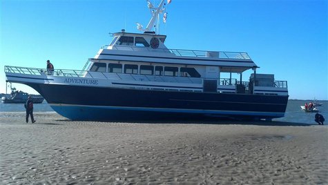 The U.S. Coast Guard and partner agencies respond to the ferry Adventure, which ran aground while carrying approximately 53 passengers near The U.S. Coast Guard and partner agencies respond to the ferry Adventure, which ran aground while carrying approximately 53 passengers near