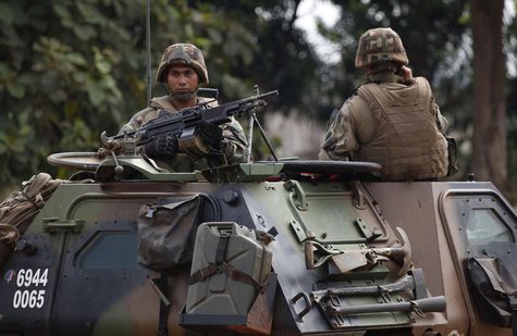 French soldiers patrol the streets in Bangui December 13, 2013. REUTERS/Emmanuel Braun French soldiers patrol the streets in Bangui December 13, 2013. REUTERS/Emmanuel Braun