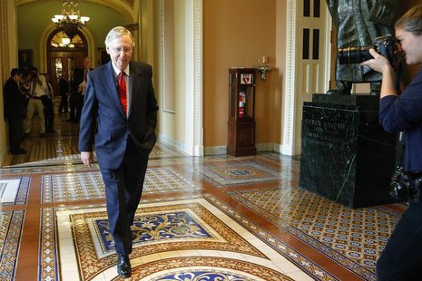 U.S. Senate Minority Leader Mitch McConnell (R-KY) returns to his office, declining to speak with reporters after a Senate Republican caucus U.S. Senate Minority Leader Mitch McConnell (R-KY) returns to his office, declining to speak with reporters after a Senate Republican caucus