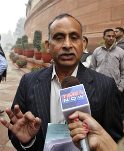Uttam Khobragade, father of Devyani Khobragade, India's deputy consul general in New York, speaks with the media after meeting India's Home Uttam Khobragade, father of Devyani Khobragade, India's deputy consul general in New York, speaks with the media after meeting India's Home